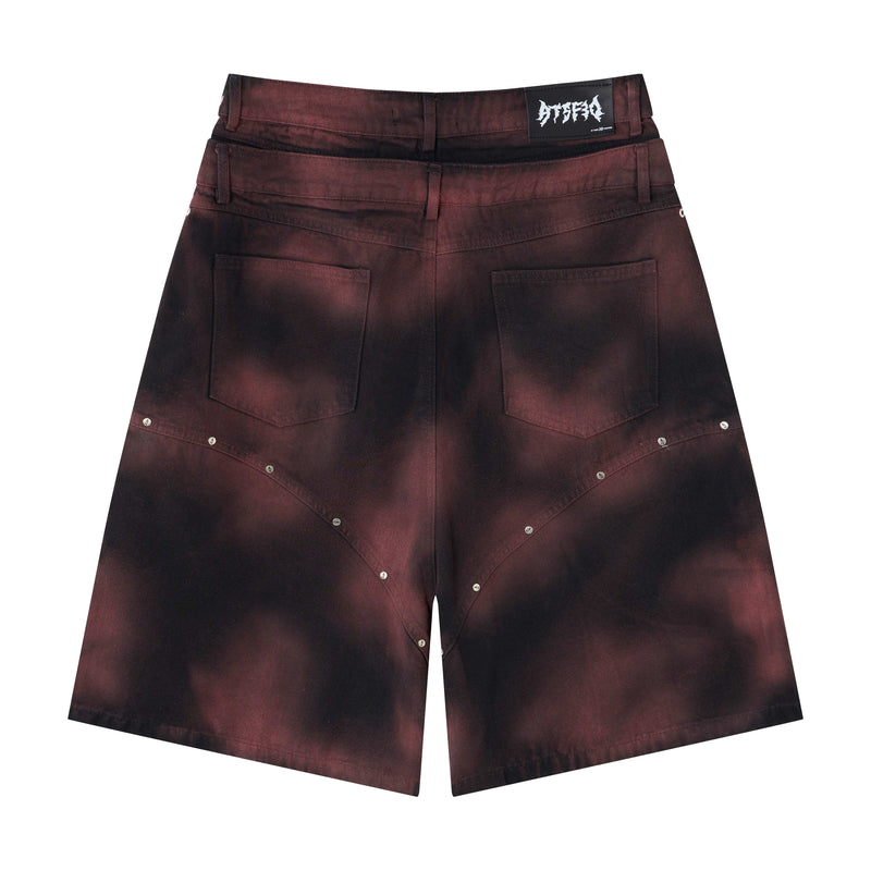 Burgundy and black denim jorts back view with plain pockets and dark wash finish