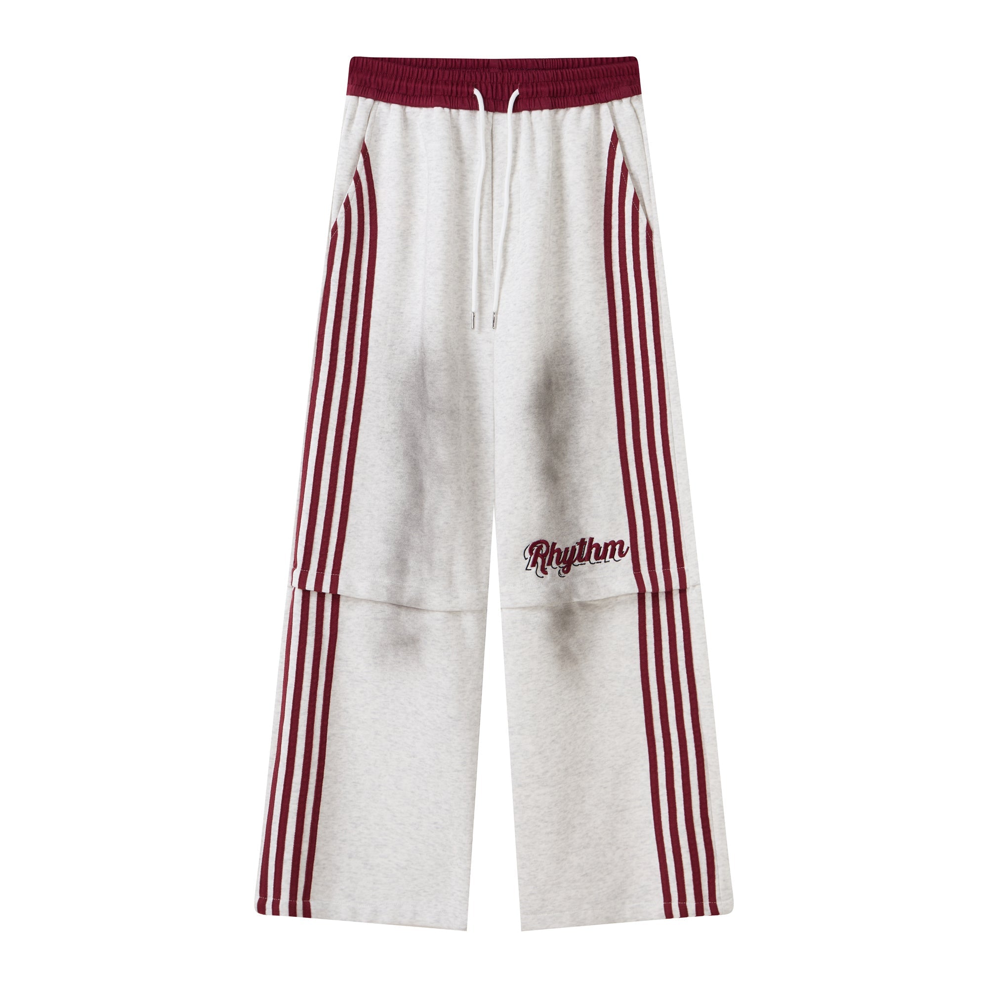 Heather grey wide-leg track pants with burgundy contrast stripes, elastic waistband, and embroidered Rhythm logo on left thig