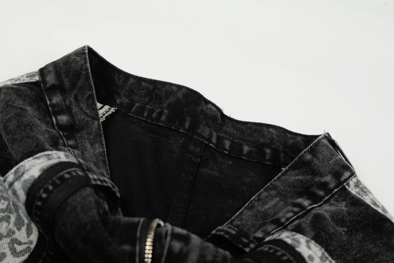 Close-up of black denim interior waistband and seam details