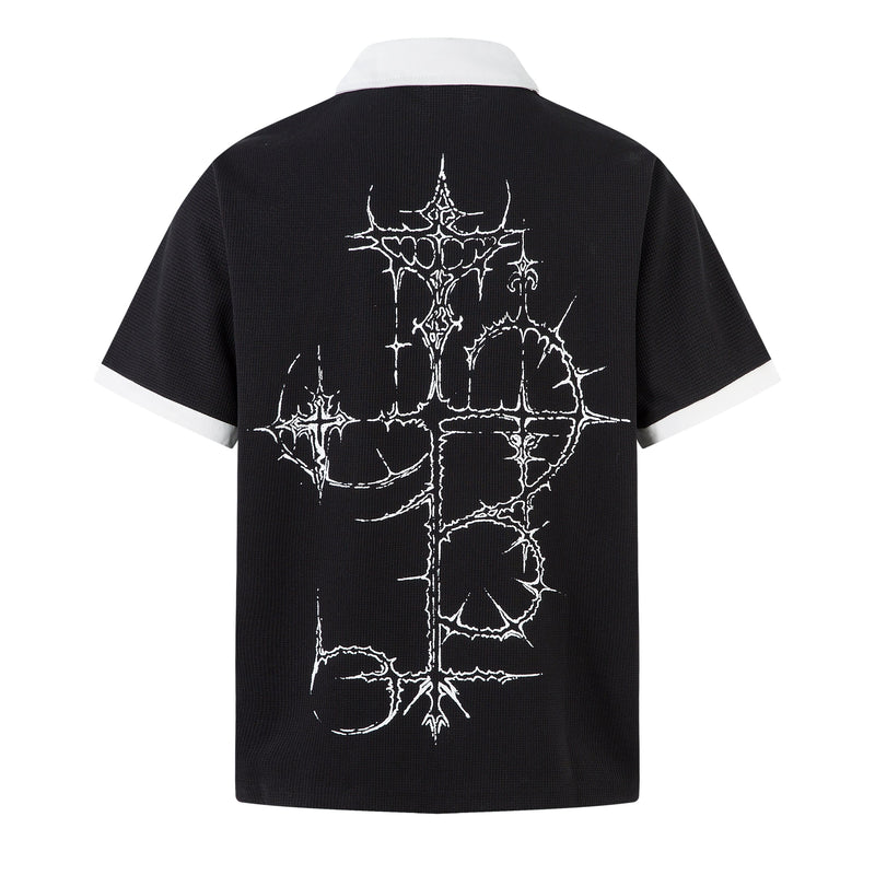 Black polo shirt with white collar and thorny gothic cross graphic on the back, dark streetwear style