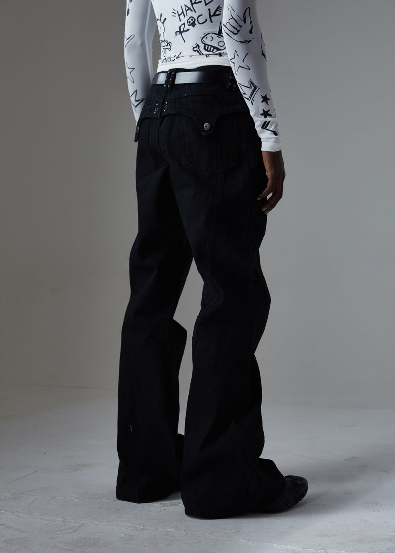 Back three-quarter view of black wide-leg jeans with studded belt loops and pocket flaps