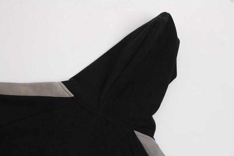 Close-up of black hood and gray shoulder panel on suede-finish zip hoodie