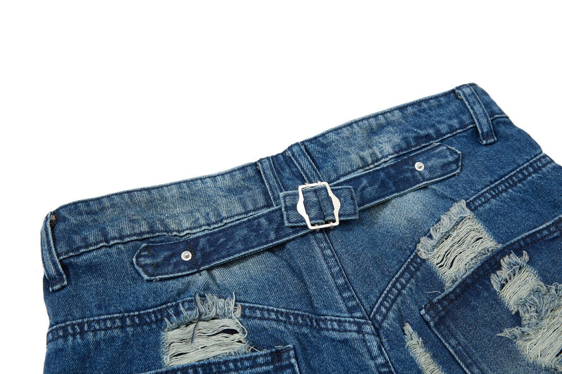Back waistband close-up showing belt strap, buckle, and ripped denim details