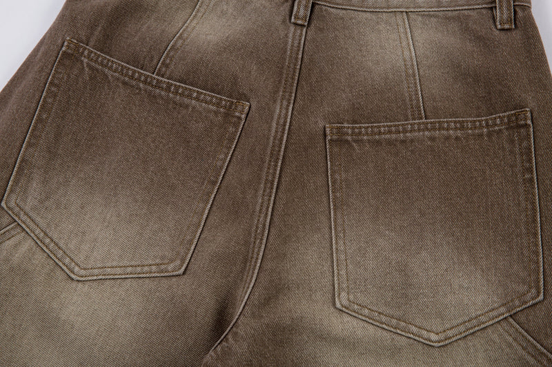 Close-up of the back pockets on brown washed barrel cargo pants