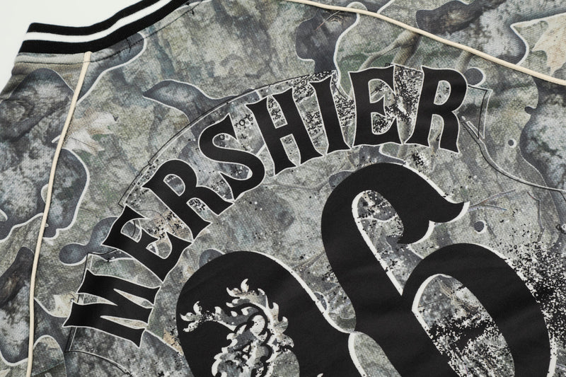 Close-up of back graphic reading Mershier over large 06 on camo jersey