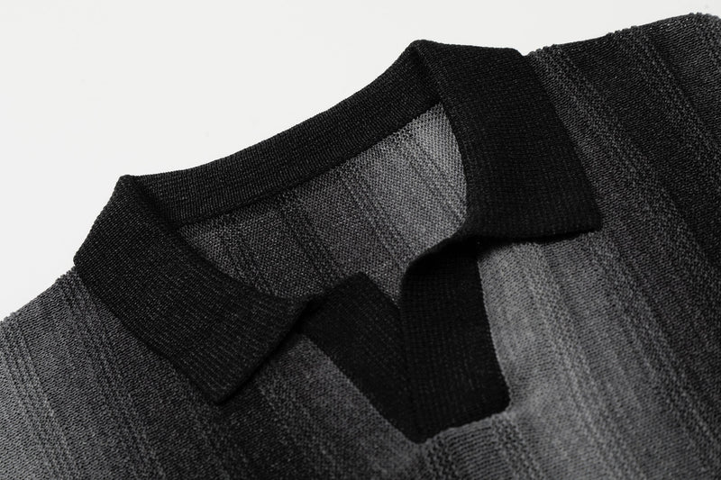 Close-up of a black and gray gradient stripe open-knit polo shirt collar and textured fabric details