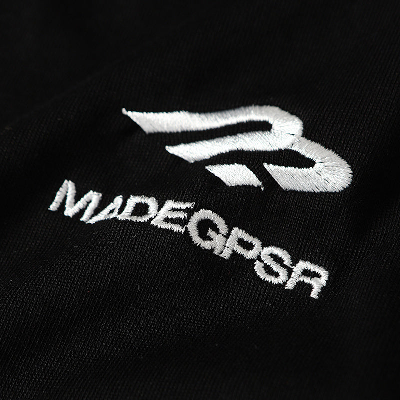 Black cotton tee with white embroidered MadeGPSR logo and triple stripe streetwear detail