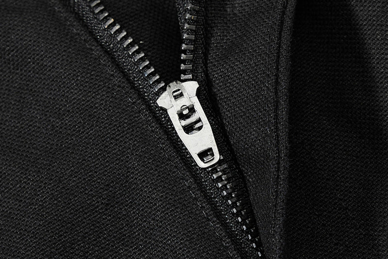 Close-up of jeans zipper fly in black denim