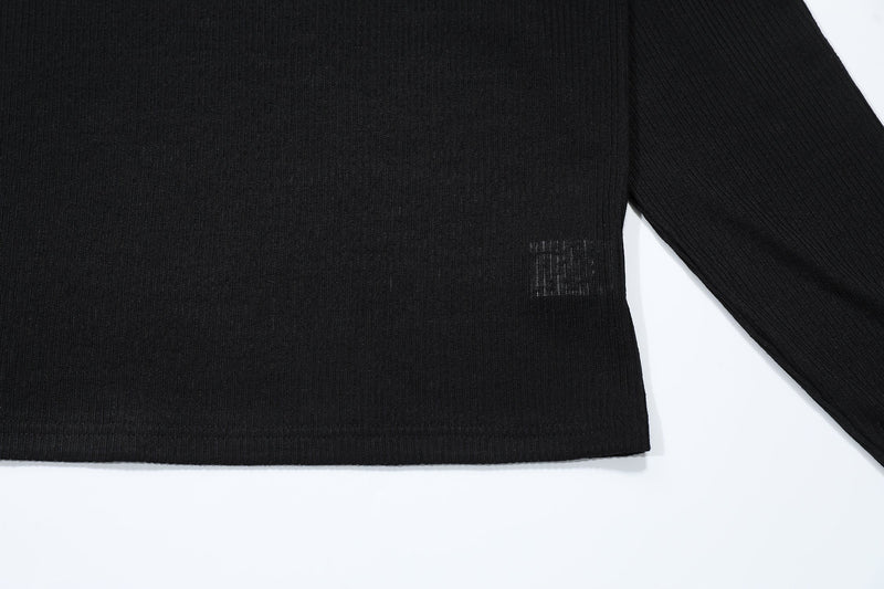 Black mesh polo hem and sleeve detail with ribbed texture