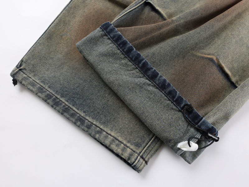 Cuffed hem detail on vintage wash wide-leg denim pants