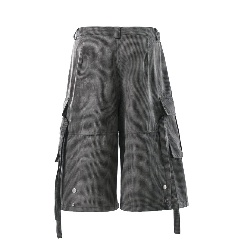 Rear view of black mesh cargo shorts showing waistband and side cargo pocket flaps