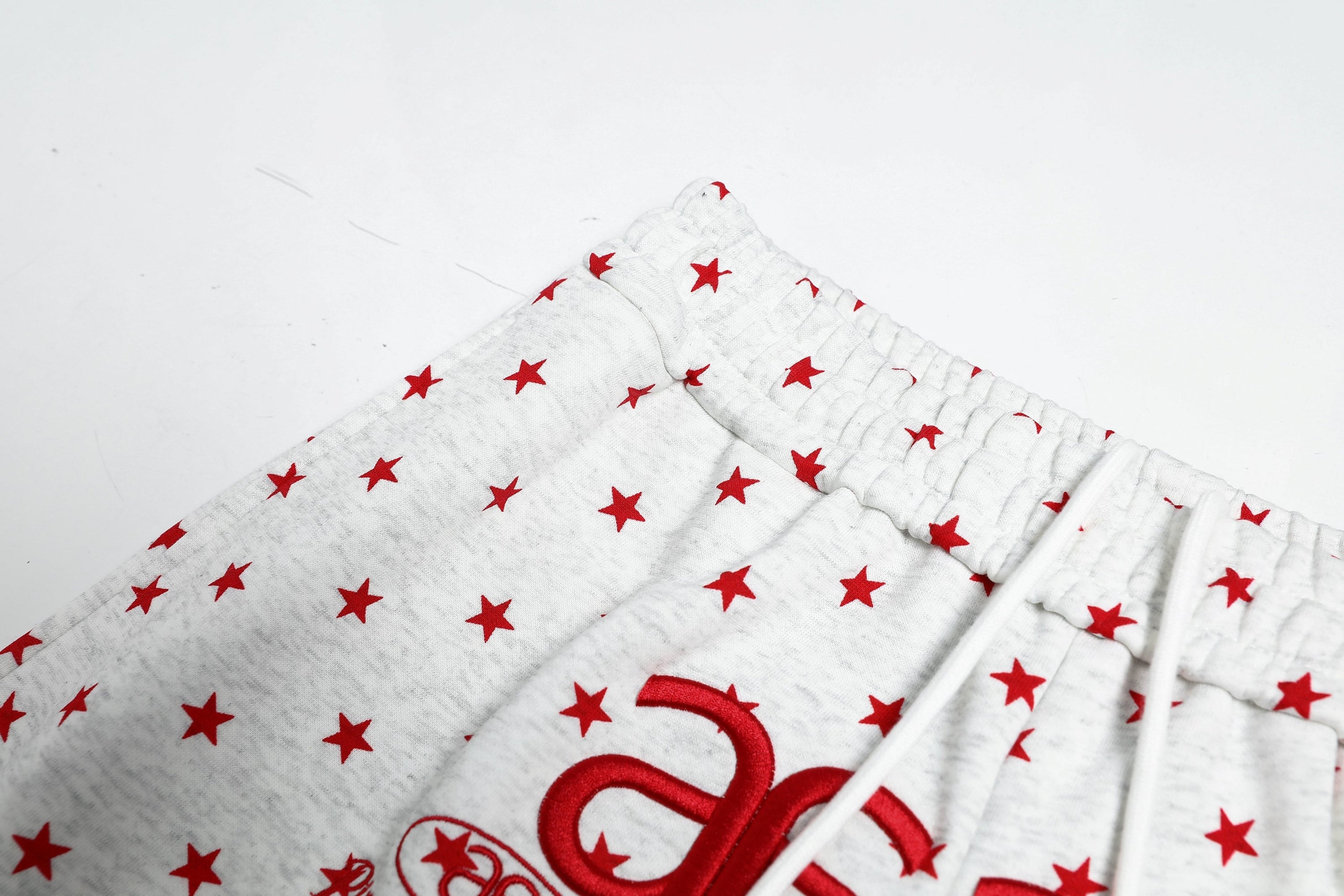 Omirad Star Print Wide-Leg Sweatpants | Streetwear