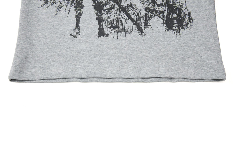 Gray graphic polo tee with black medieval knight print and distressed streetwear style hemline