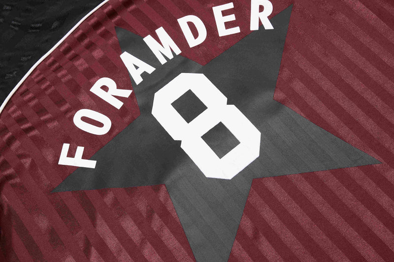 Burgundy and black football jersey fabric with bold star graphic and FORAMDERGTS 8 print