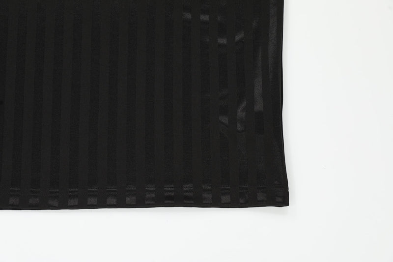 Black striped mesh soccer jersey tee with a ribbed hem, shown against a clean white background