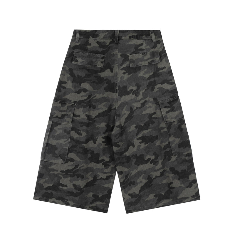 Back view of gray-black camouflage cargo shorts with flap pockets and wide-leg fit