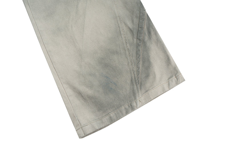 Close-up of pant hem on washed grey cotton utility pants
