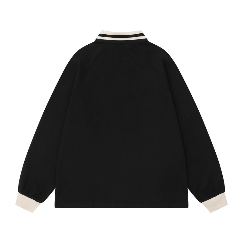 Back view of black rugby polo sweatshirt with cream striped collar and cream ribbed cuffs