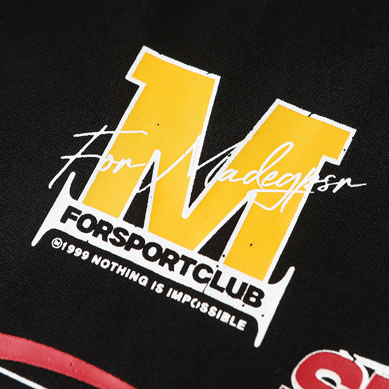 Black oversized cotton T-shirt with a bold yellow M motorsport racing graphic and For Motorsport Club print