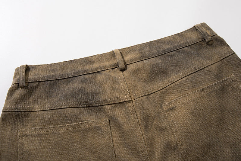 Back waistband close-up of olive brown washed cargo shorts with belt loops