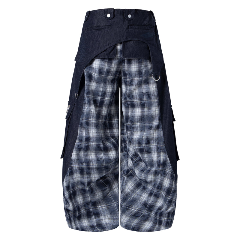 Back view of black wide-leg cargo pants with gray plaid panels and layered cargo pockets