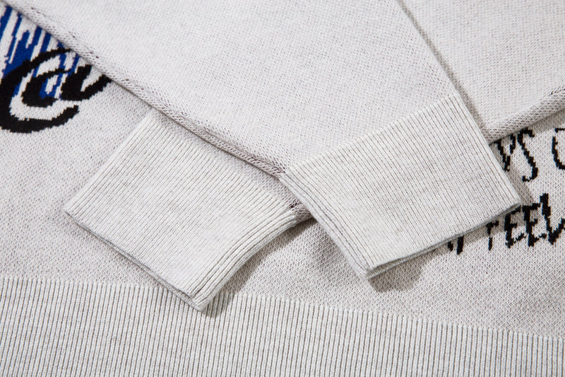 Close-up of ribbed cuffs and knit texture on the sweater sleeve