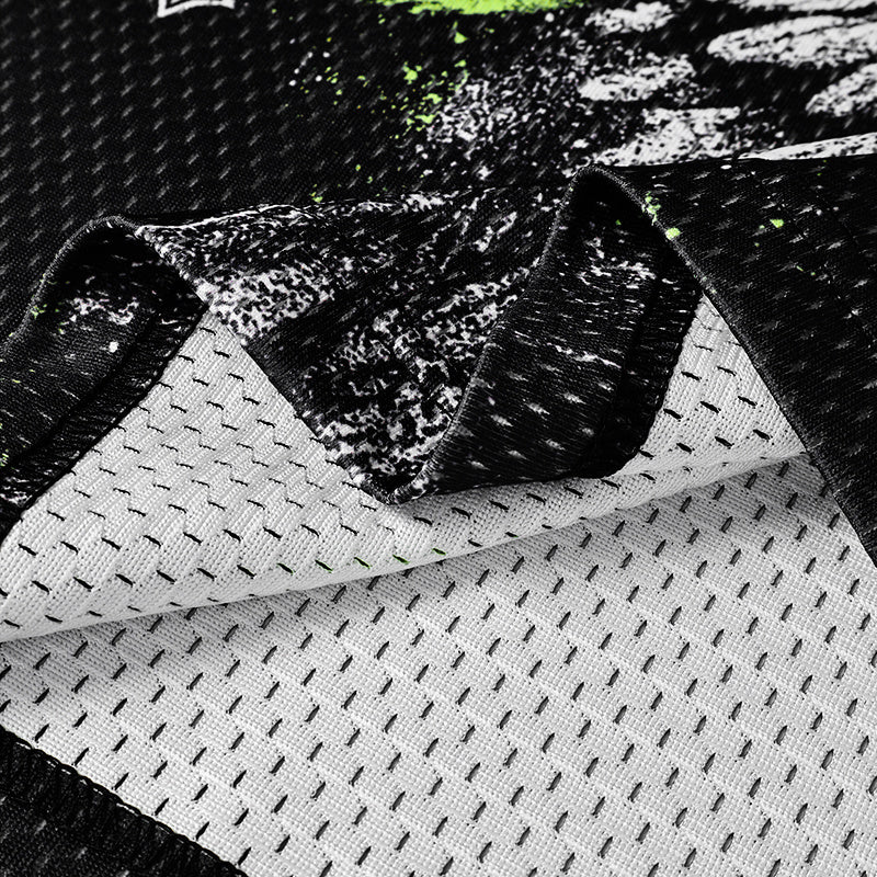Black and white mesh football jersey fabric with gothic angel graphic and dark streetwear texture