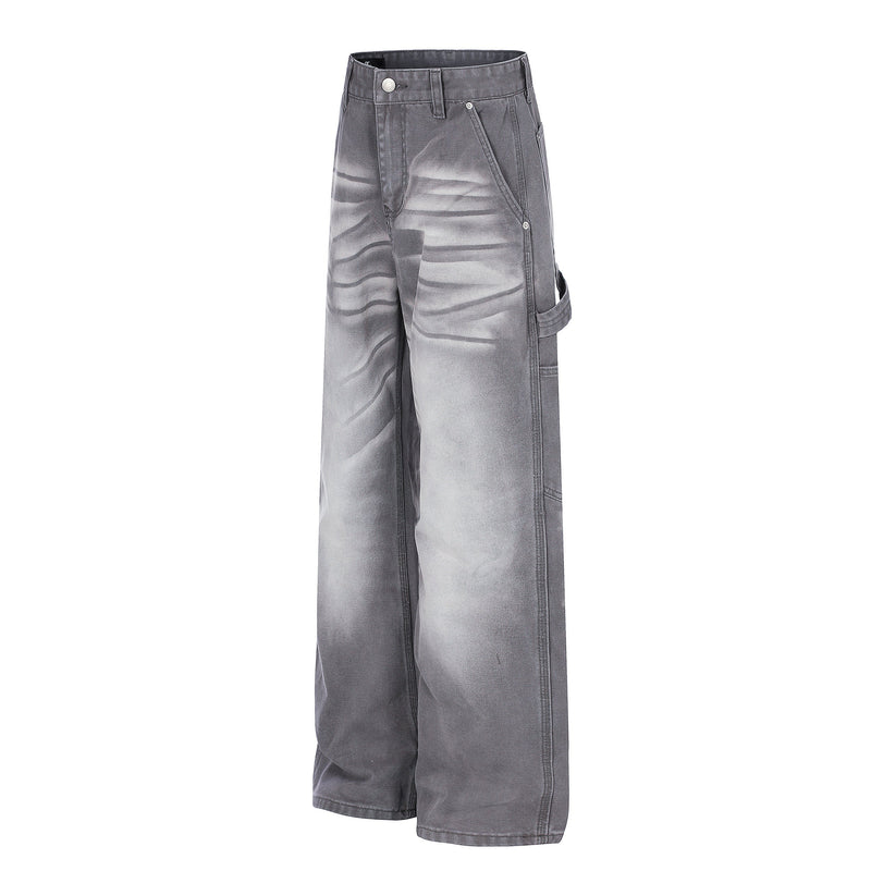 Angled front view of gray wide-leg denim jeans with side cargo pocket and washed wrinkle effect