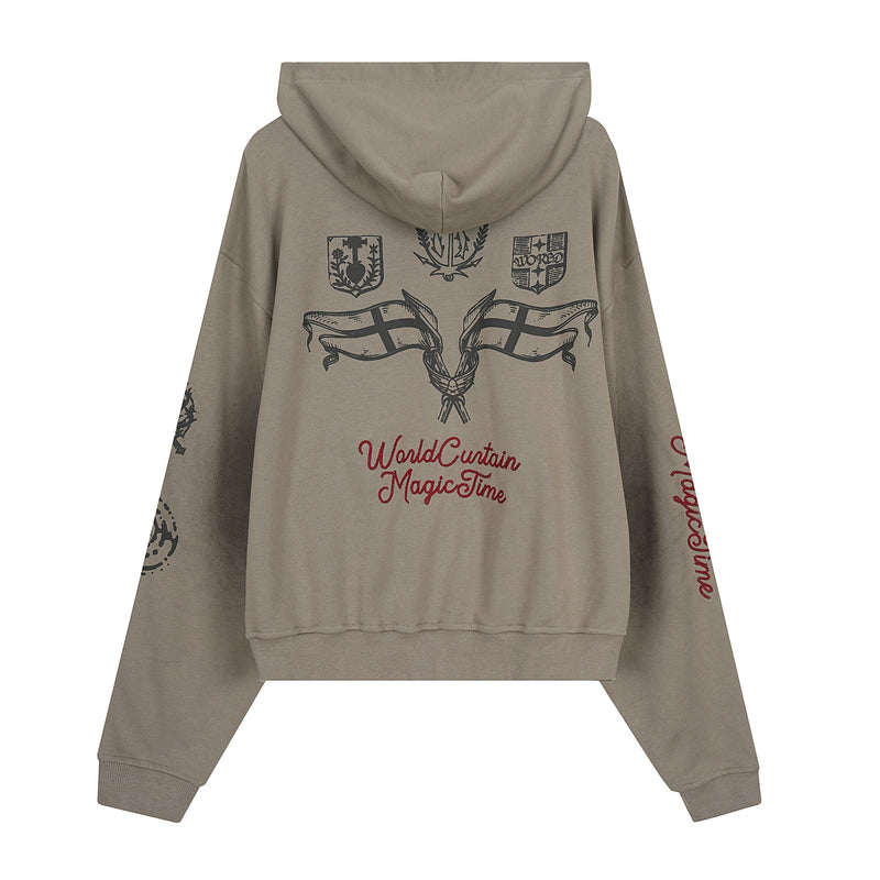 Taupe zip-up hoodie back view with black crest graphics and red script text