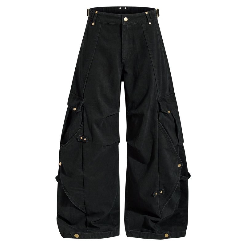 Front view of black wide-leg cargo pants with snap details and oversized leg pockets