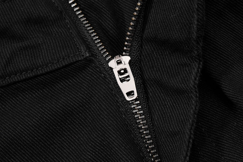 Close-up of black fabric zipper with silver teeth on cargo pants