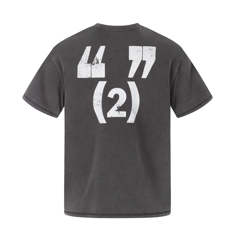 Dark washed graphic tee with oversized distressed white 44, 77, and 2 print on the back in streetwear style