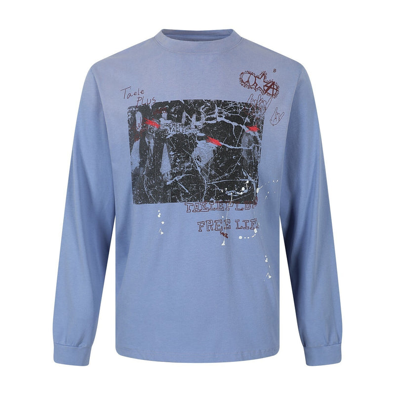 Light blue long-sleeve T-shirt with distressed black graphic and red scribble accents on the front