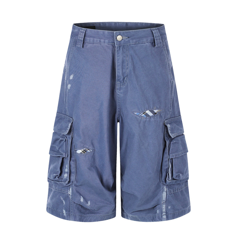 Blue distressed cargo shorts with front button closure and flap cargo pockets