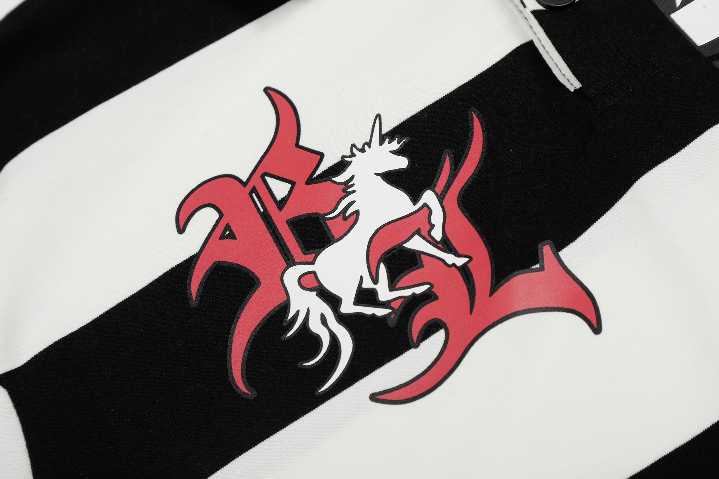 Omirad Rugby Stripe Graphic Polo Shirt | Black & White