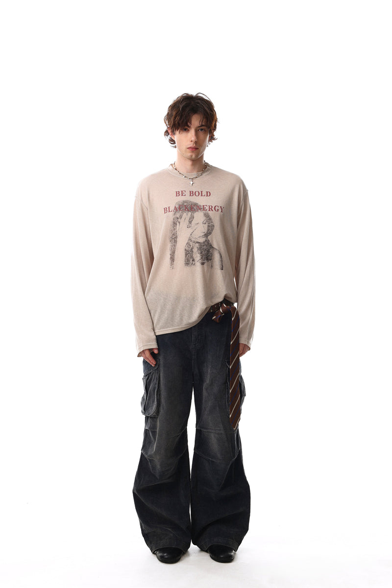 Be Bold Black Energy beige long sleeve tee worn by model, full-length front view