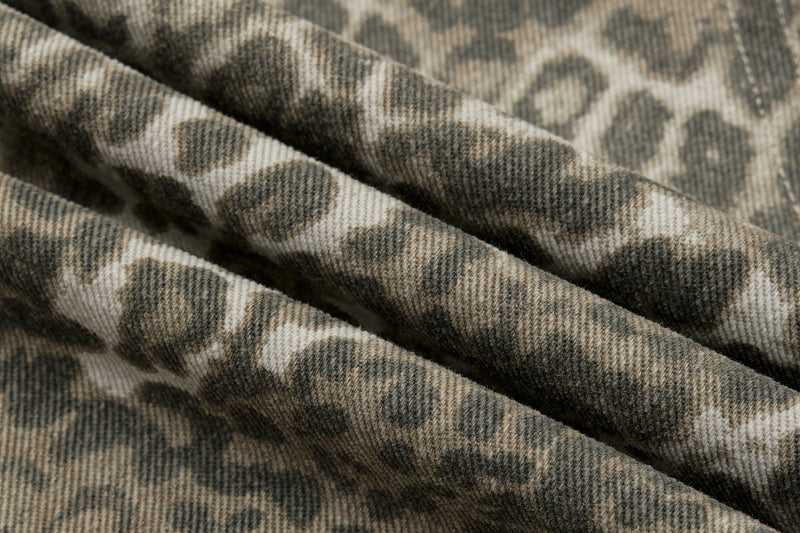 Close-up of pleated leopard print fabric texture
