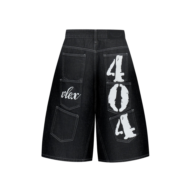 Back view of black denim shorts with patch pockets and large white graphic prints