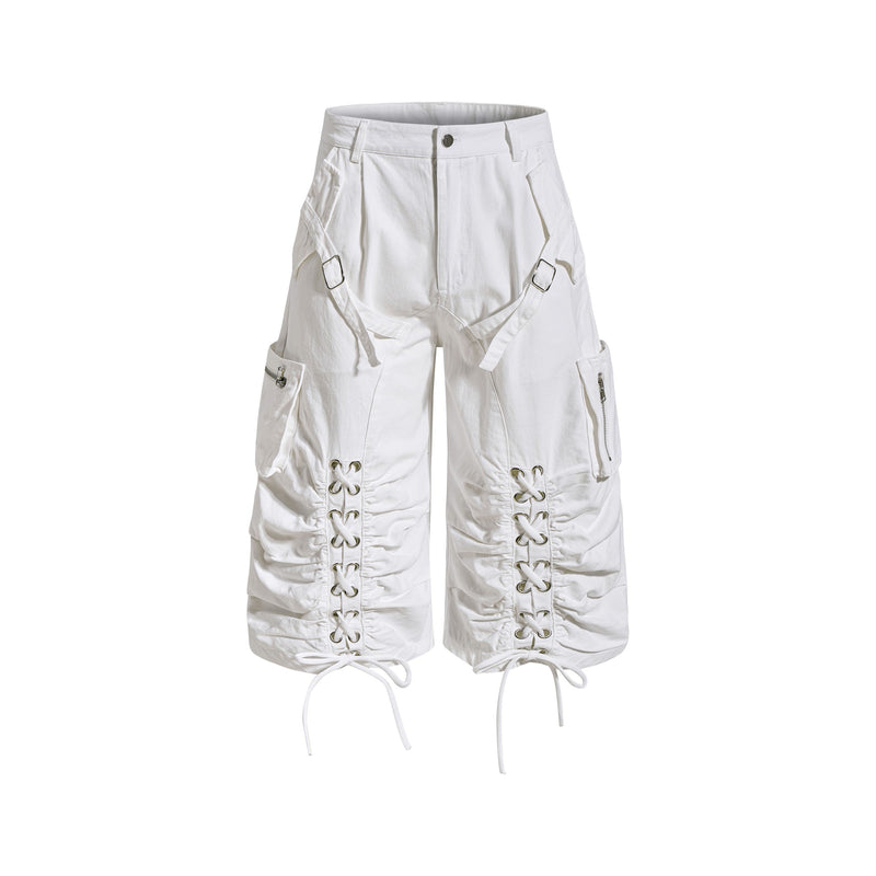 White utility cargo shorts with lace-up front panels, front view