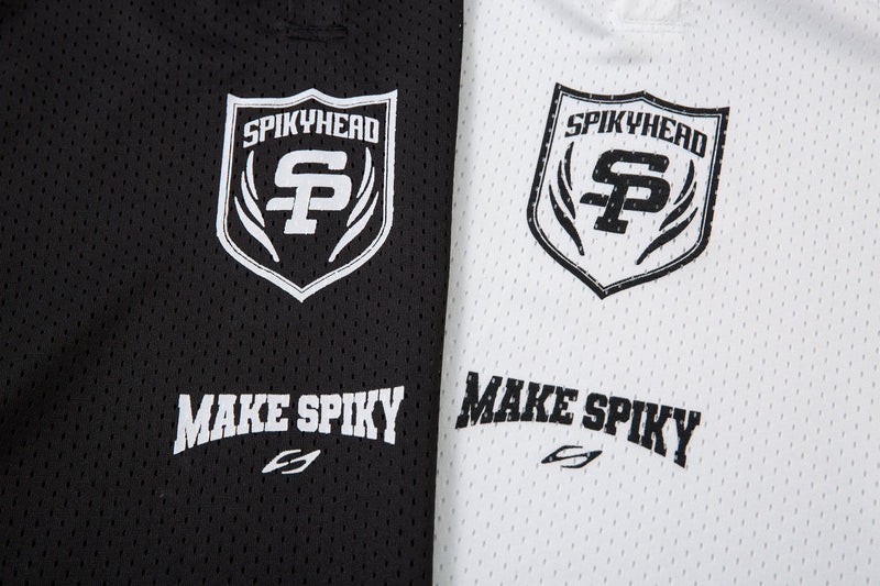 Black and white mesh polo shirt with Spikyhead crest logos and Make Spiky text in a colorblock streetwear style