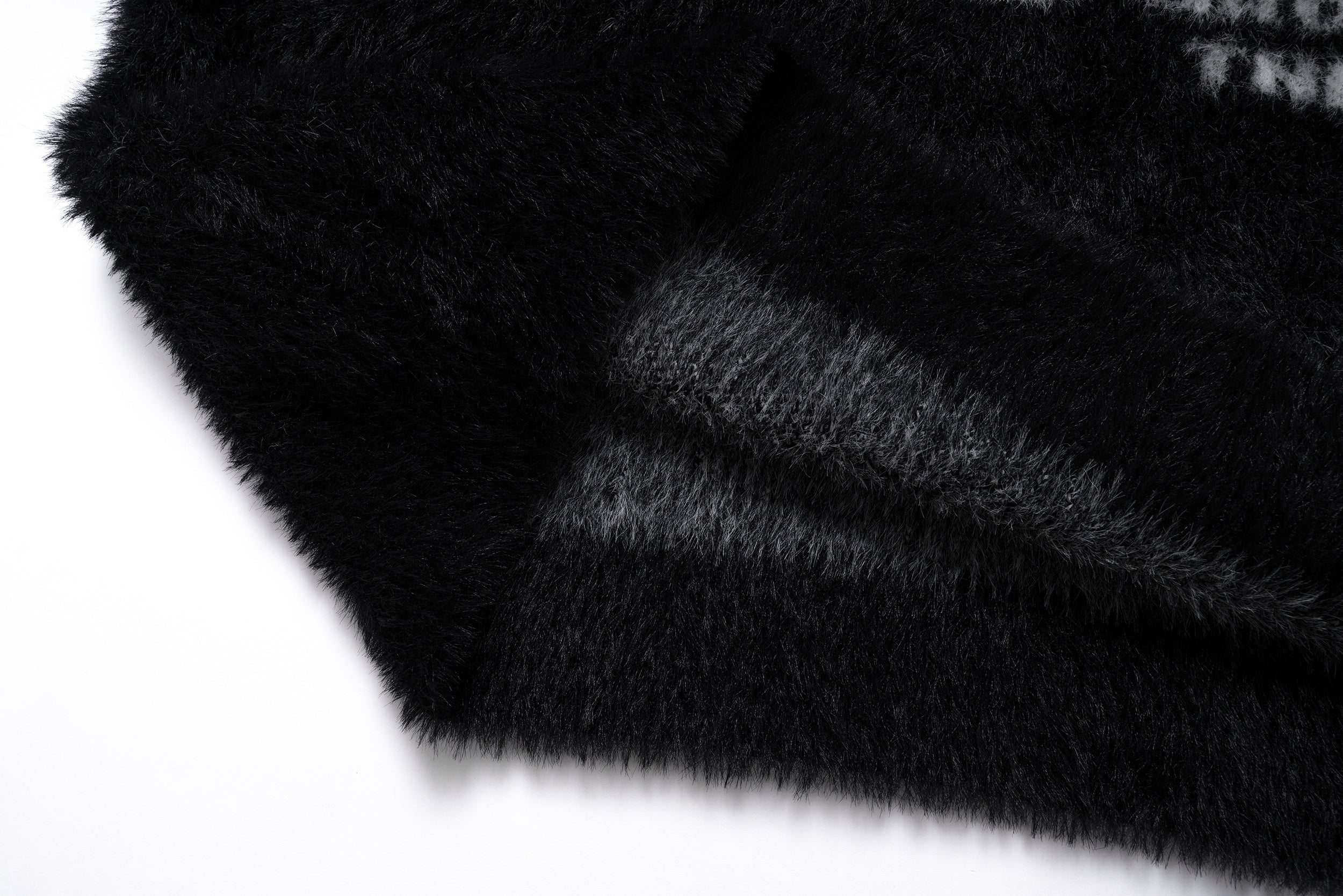 Omirad Fluffy Crest Knit Sweater | Black Graphic Fuzzy Pullover