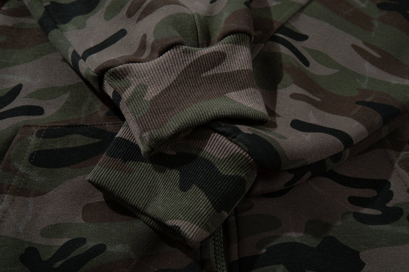Close-up of camouflage sleeve cuff and ribbed knit hem