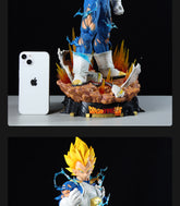 The Seakoff Vegeta Collectible Figure (55cm) features Super Saiyan spiky yellow hair and torn blue clothing on a fiery base with the "Dragon Ball GT" logo. Positioned next to an iPhone, it showcases crossed arms, reminiscent of Dragon Ball Z&