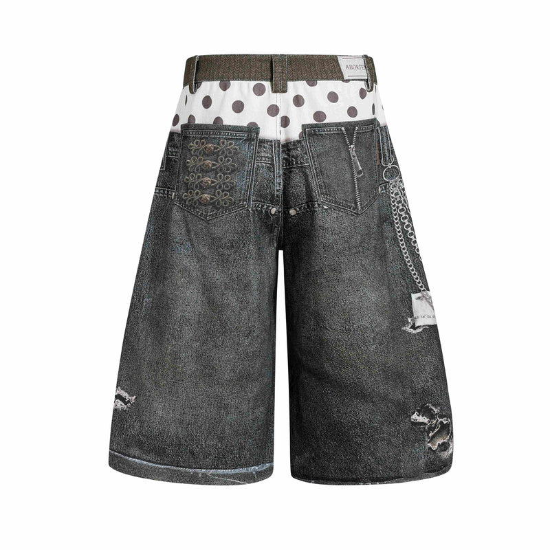 Back view of wide-leg denim jorts with polka-dot waistband, printed back pockets, and chain graphic