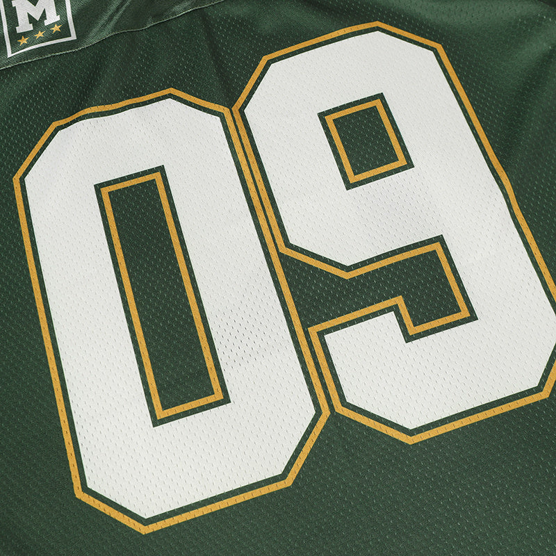 Green varsity football jersey with oversized white number 09 and gold trim on mesh fabric