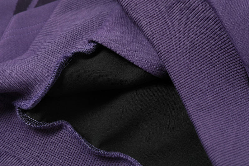 Close-up of purple hoodie hood lining and ribbed trim