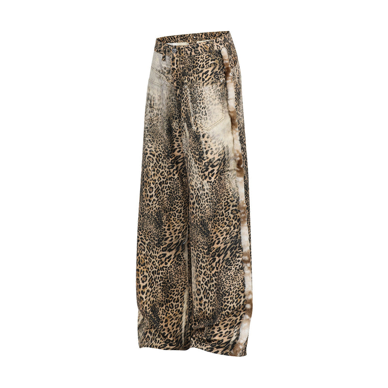 Angled side view of leopard print wide-leg jeans with fur-trim along one leg