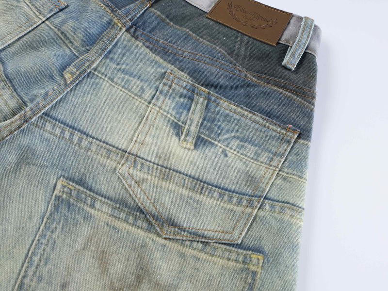Back pocket detail on faded blue balloon jeans with brown patch label