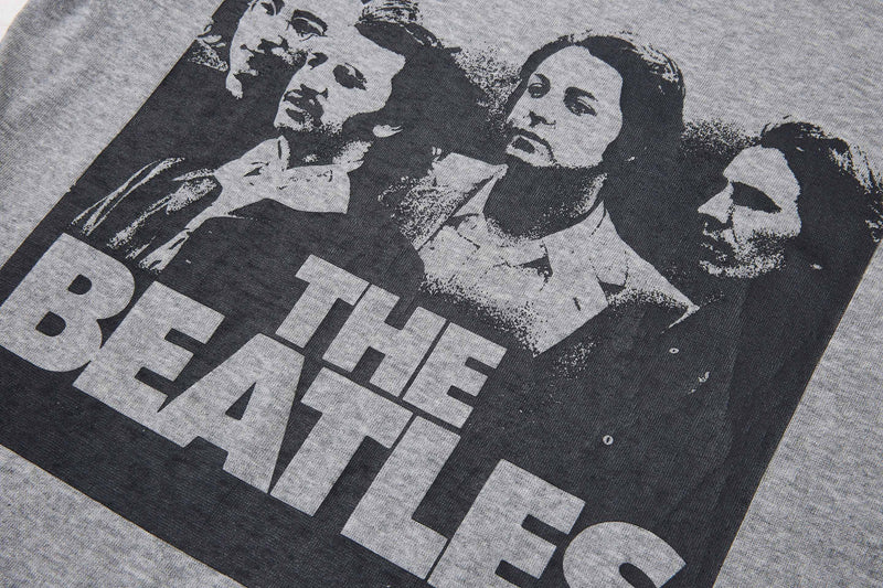 The Beatles vintage graphic tee with black-and-white band portrait print on heather gray fabric