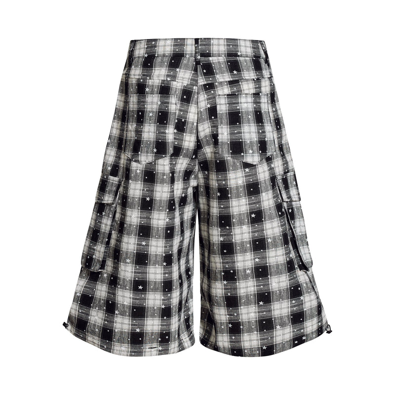 Back view of black and white plaid cargo shorts with star print and cargo pockets